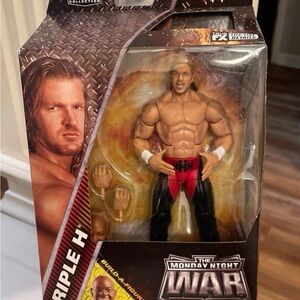 WWE Elite Triple H Action Figure. Monday Night War- by Mattel.  New in box